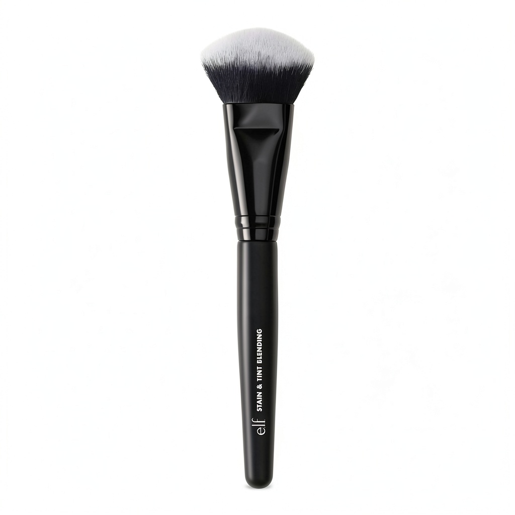 elf liquid blush brush being used on a model's cheek